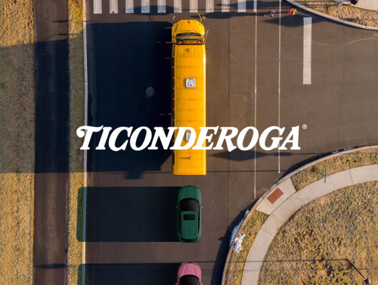 Yellow School Bus Followed By Green and Pink Cars Ticonderoga Graphic